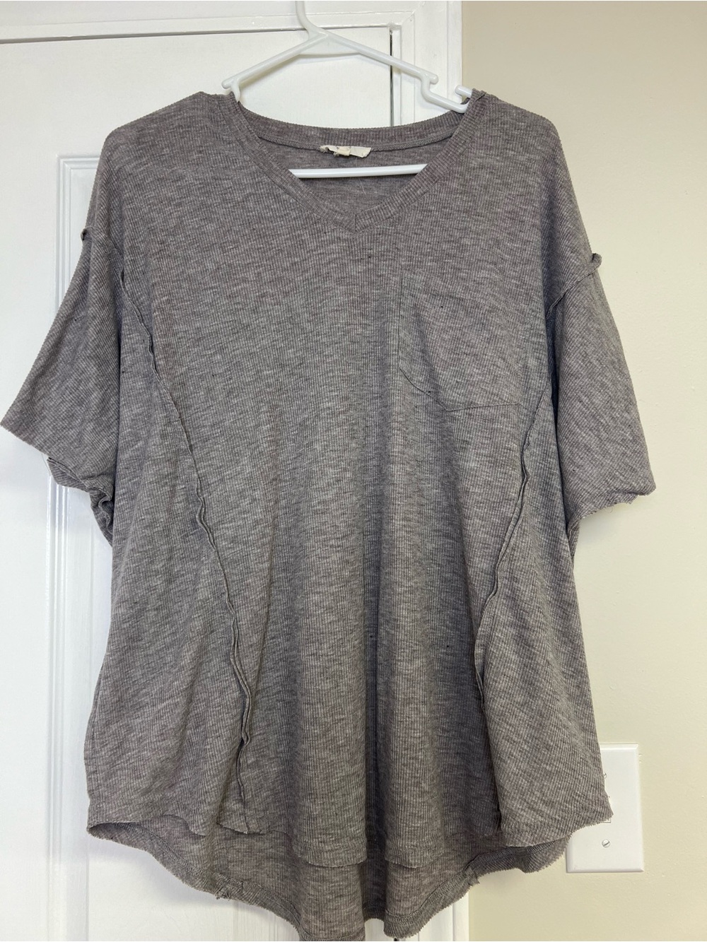 Oversized, short-sleeve V-neck top from the boutique brand Easel